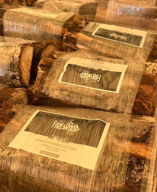 Shrink-wrapped firewood bundles stored indoors, That Firewood Place, Woodlands MB